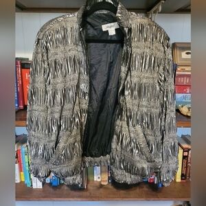 Retro metallic silver jacket with shoulder pads. Women's large